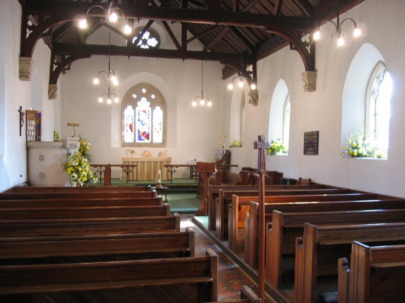View of the interior of Charlton Church looking towards the altar